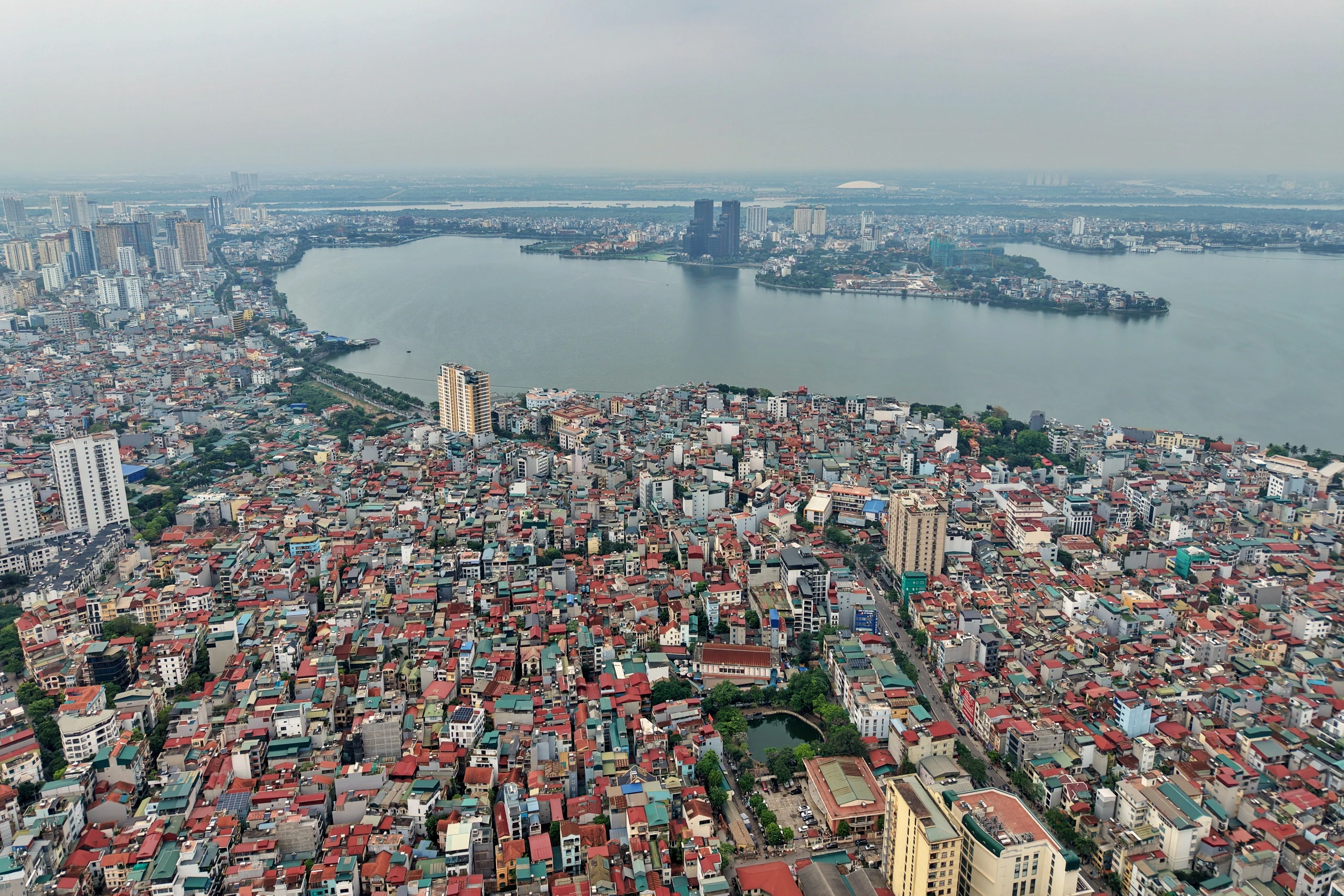 How are Hanoi residents in urban reconstruction areas supported?